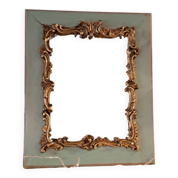 Miroir ancien de style Louis XV en bois et stuc doré.