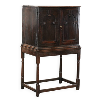 Unique antique English cabinet on stand made of oak from the 17th century