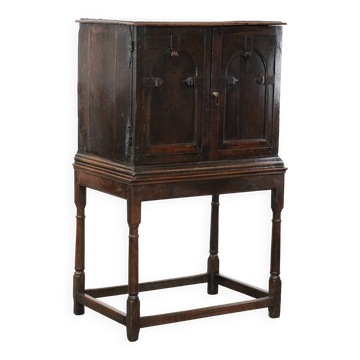 Unique antique English cabinet on stand made of oak from the 17th century