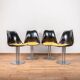Set of black and yellow tulip chairs