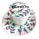 Antique herbal tea cup with mint infusion