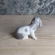 Small spaniel dog in porcelain