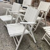 Five wooden garden armchairs