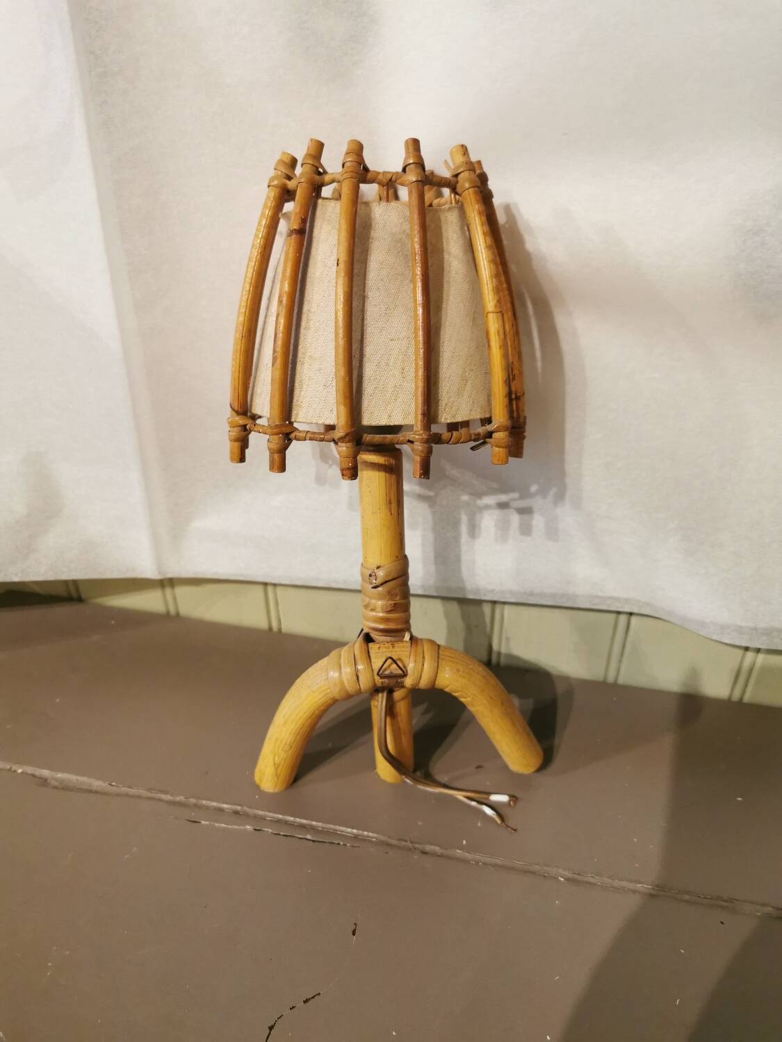 Vintage rattan wall light by Louis Sognot