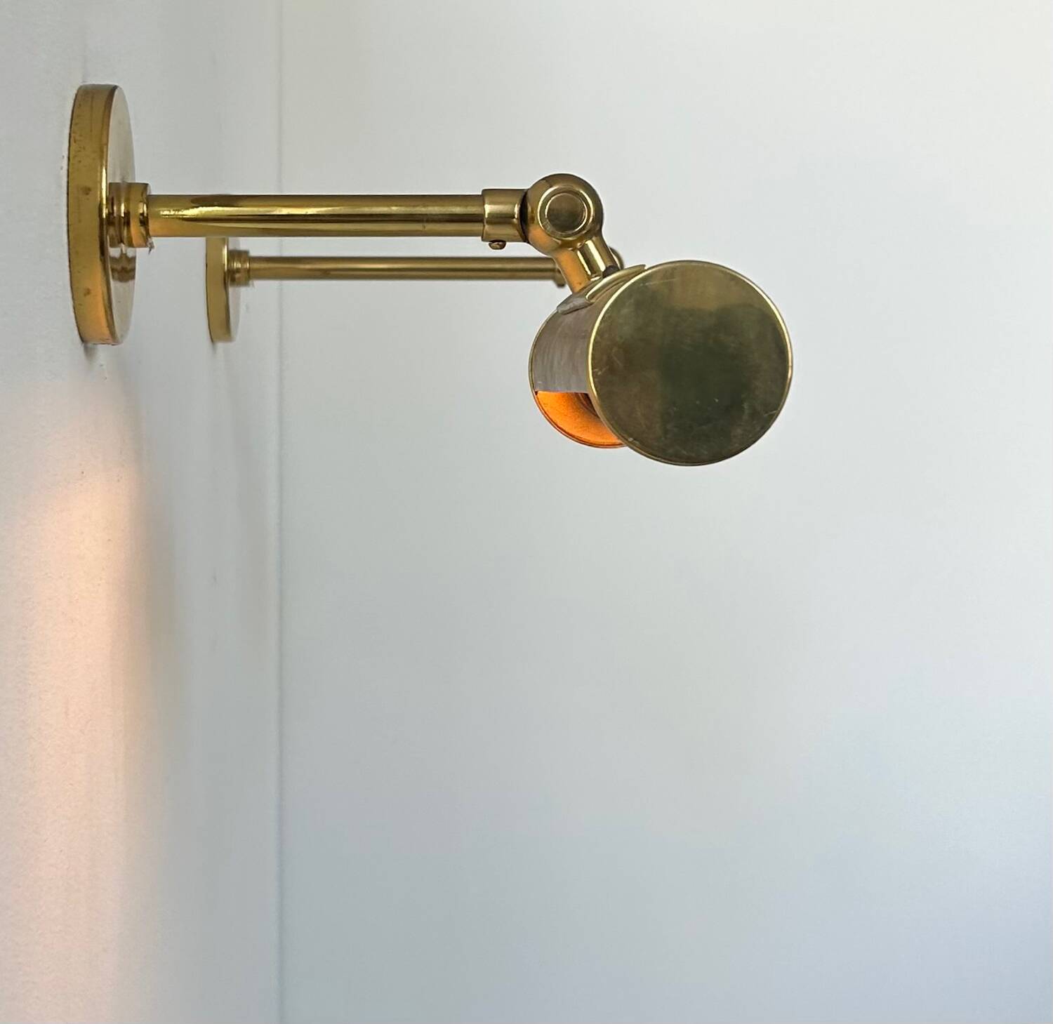Pair of vintage adjustable wall lights, solid brass, France 1950