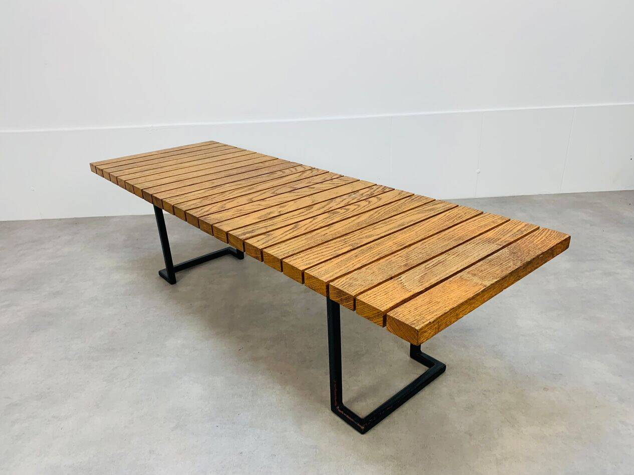 1950s coffee table in the style of Alain Richard, wood and metal.