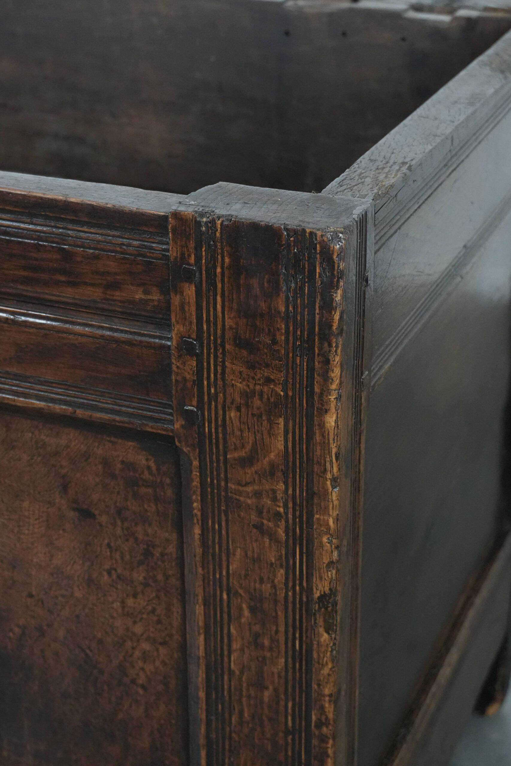 Large antique panelled English oak chest from the 18th century