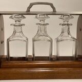 Portable Art Deco liquor cabinet in mahogany & metal with 3 Baccarat crystal bottles.