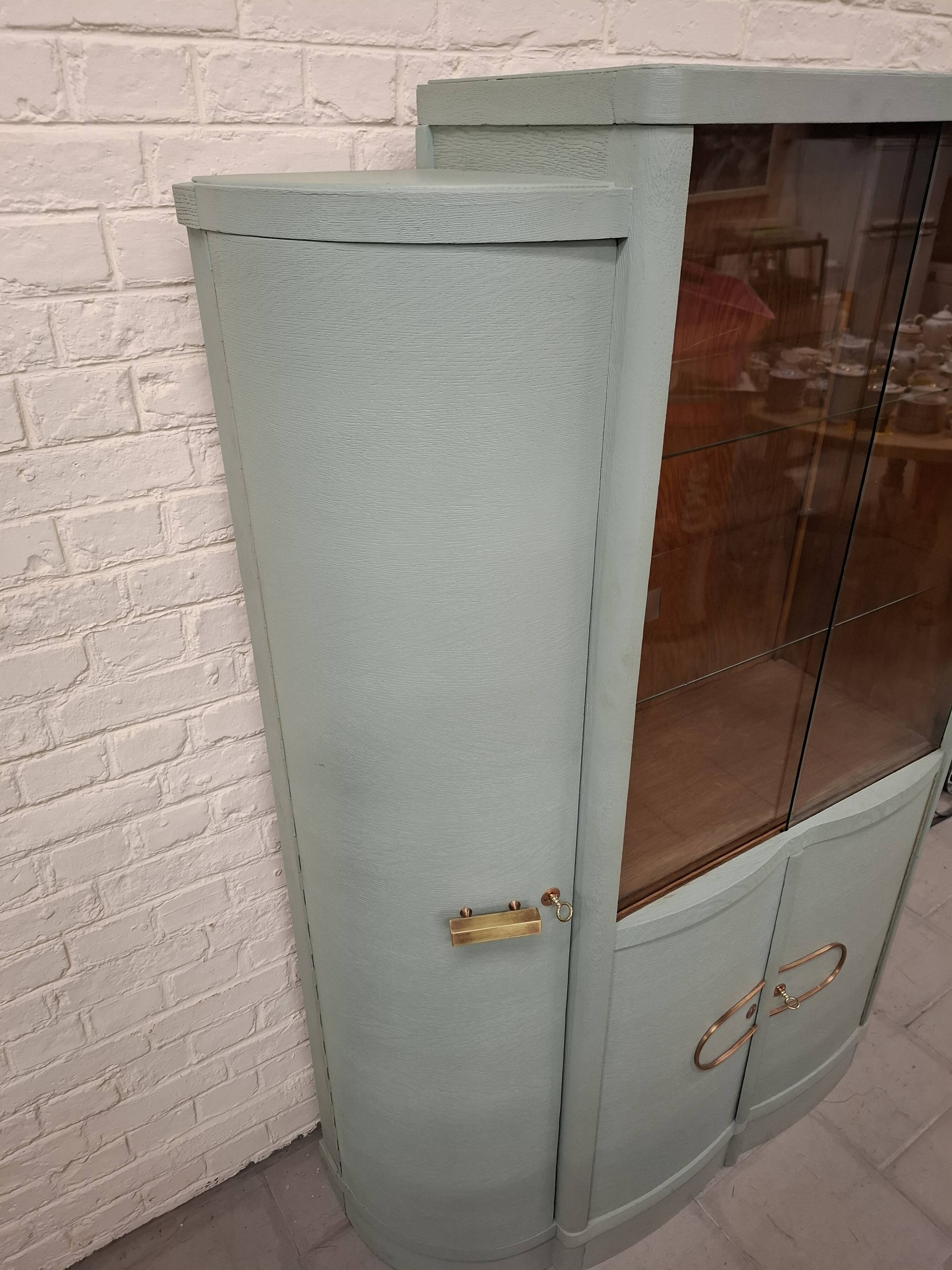 Vintage glass-fronted cabinet, bookshelf.