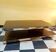 Designer coffee table in glass and chrome metal.