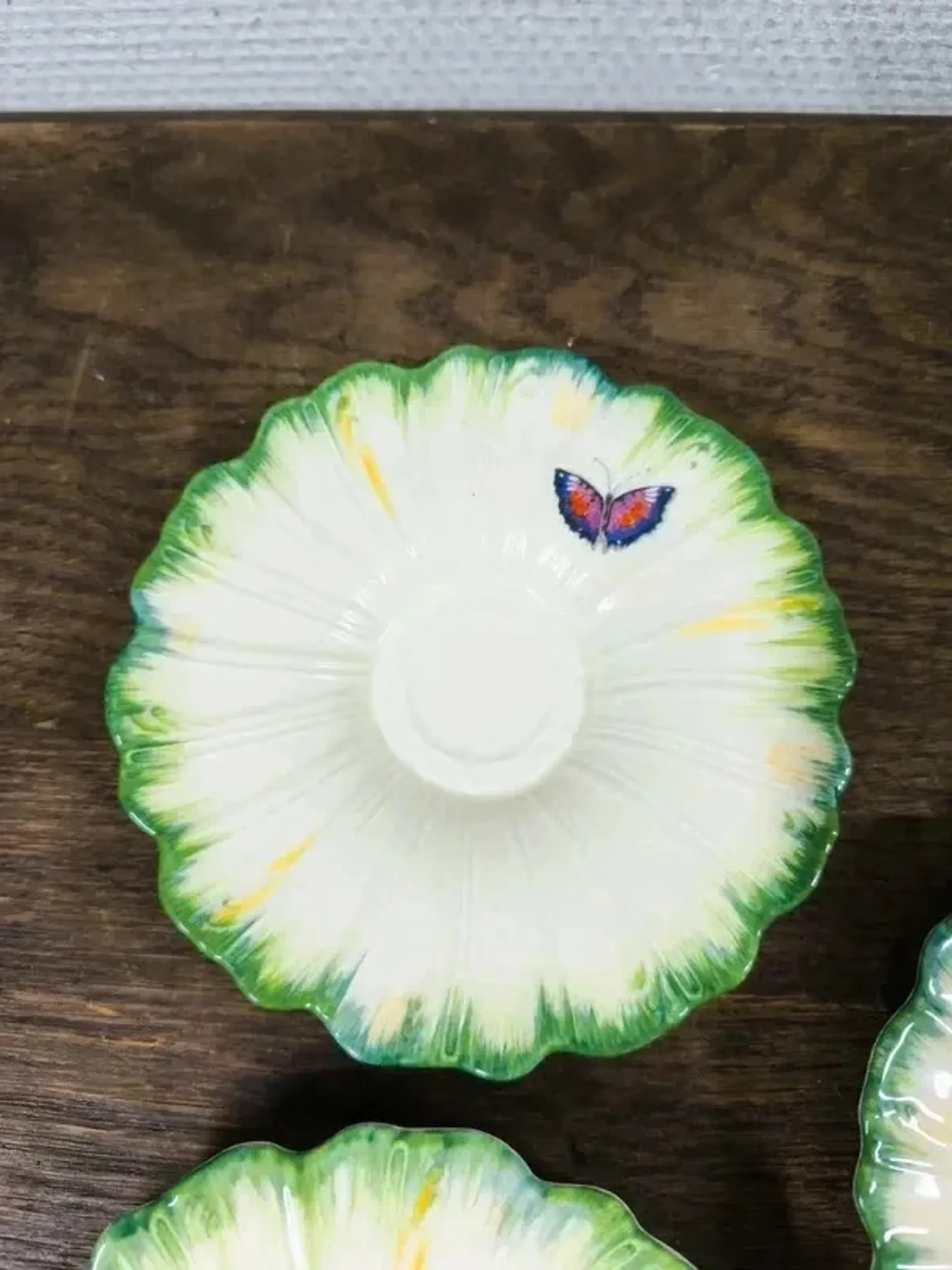 Set of 3 antique Lunéville butterfly saucers / saucers in barbotine.
