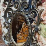 Antique Louis XV style mirror, richly carved with scrollwork, shells, and foliage.