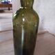 Old thick glass bottle