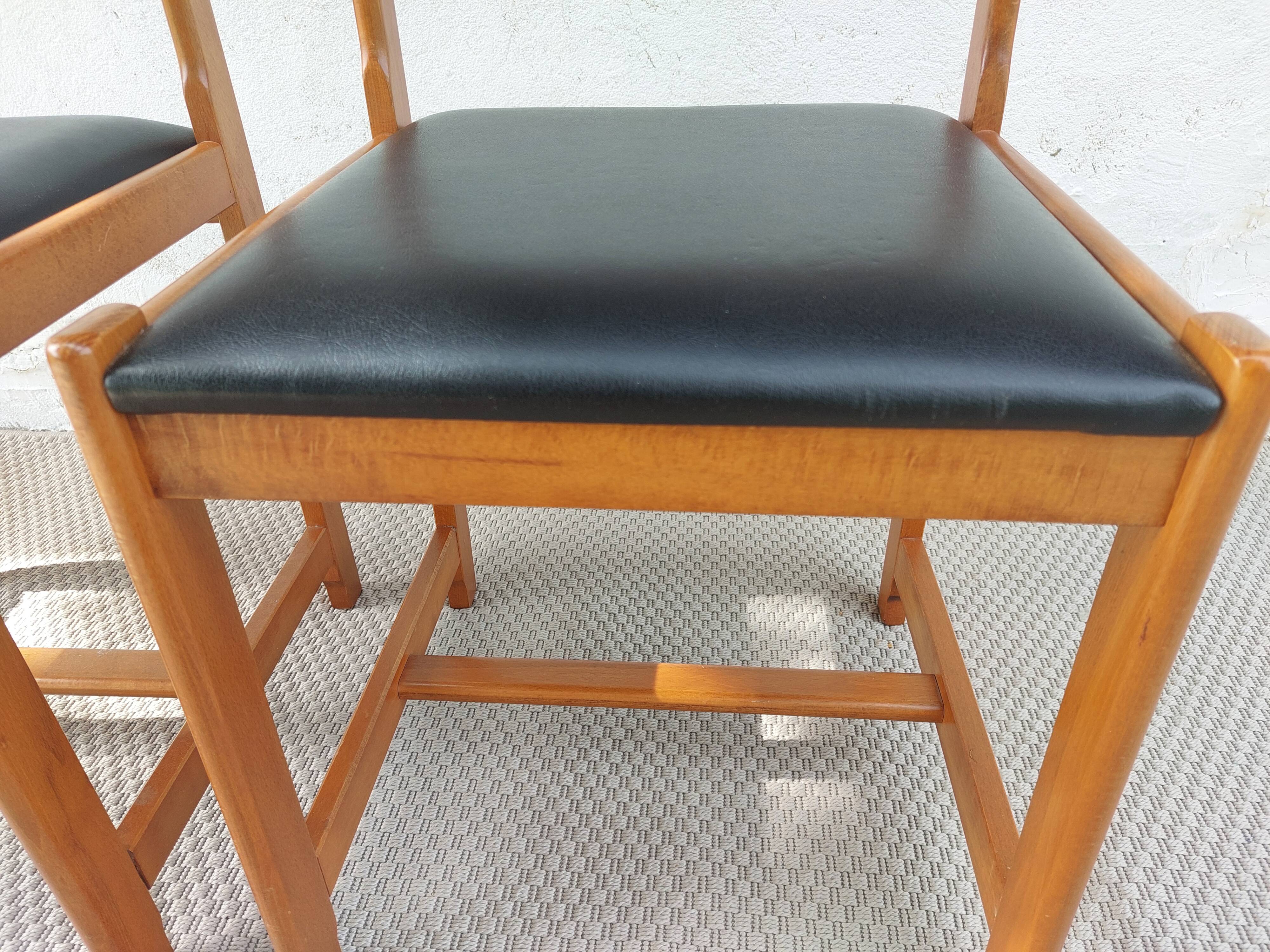 paire de chaises style scandinave, simili cuir noir