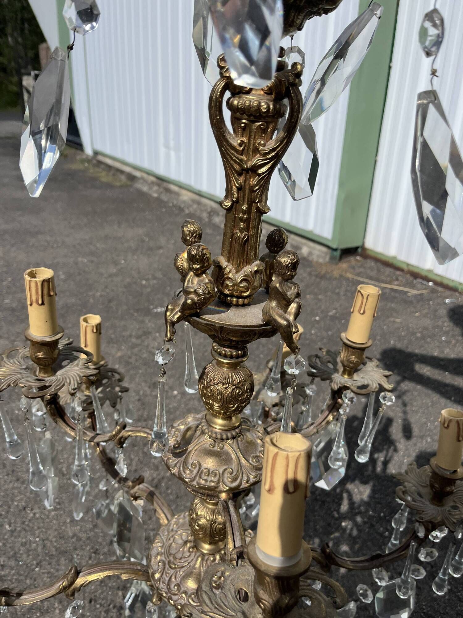 Large antique chandelier with 9 lights, bronze and cut glass pendants, cherubs, style