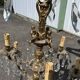 Large antique chandelier with 9 lights, bronze and cut glass pendants, cherubs, style