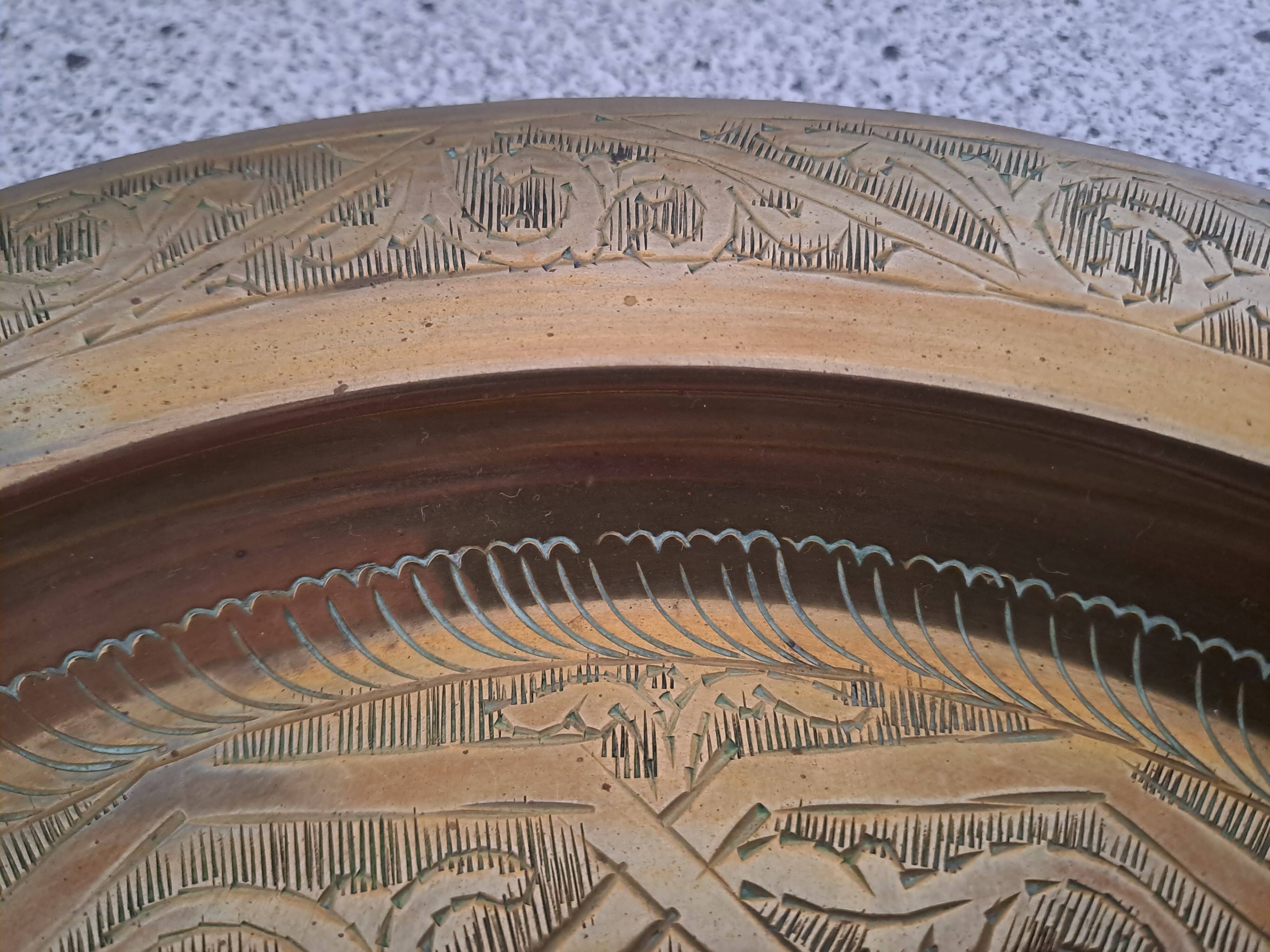 Large chiseled metal plate