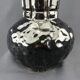 The Foulon, vase with iridescent black cover