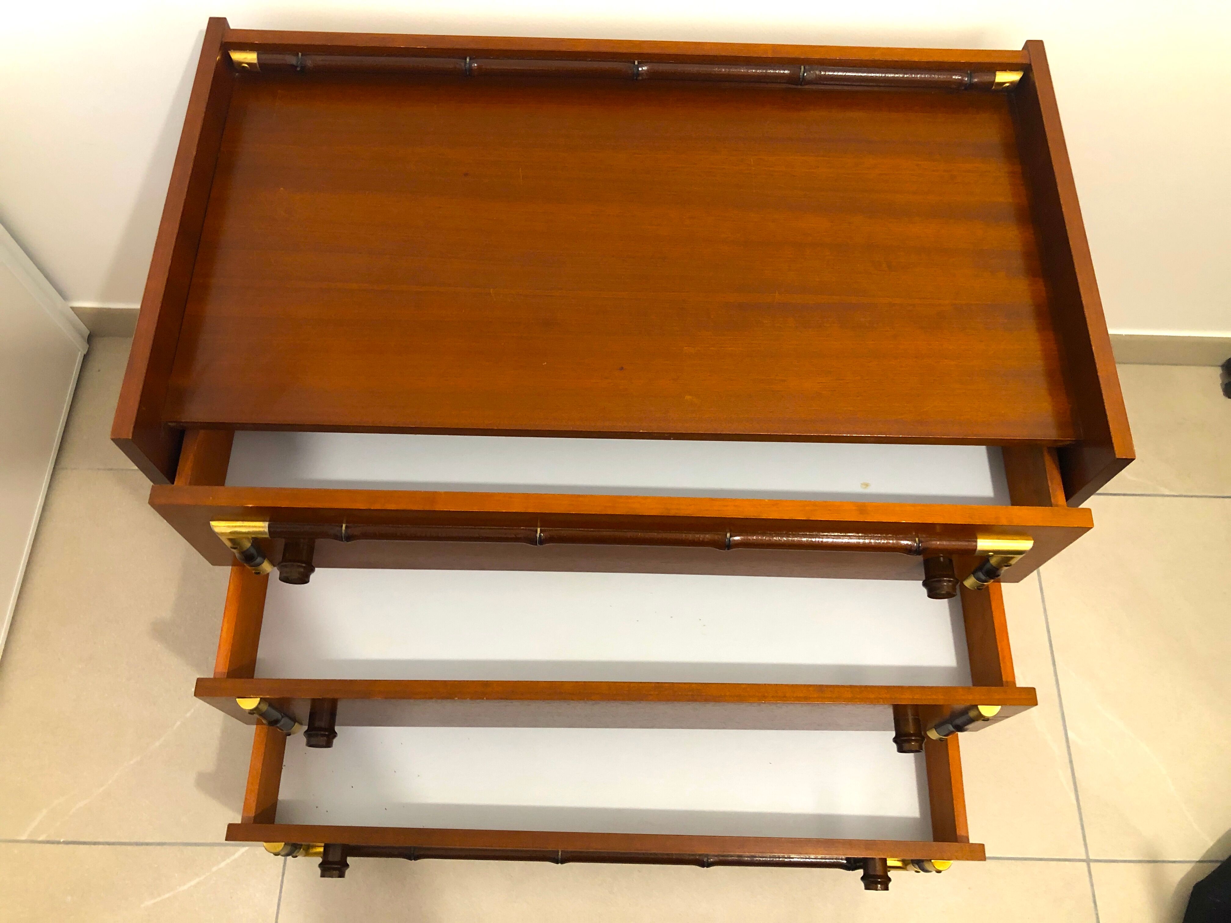 Vintage wooden and gilded chest of drawers colonial style