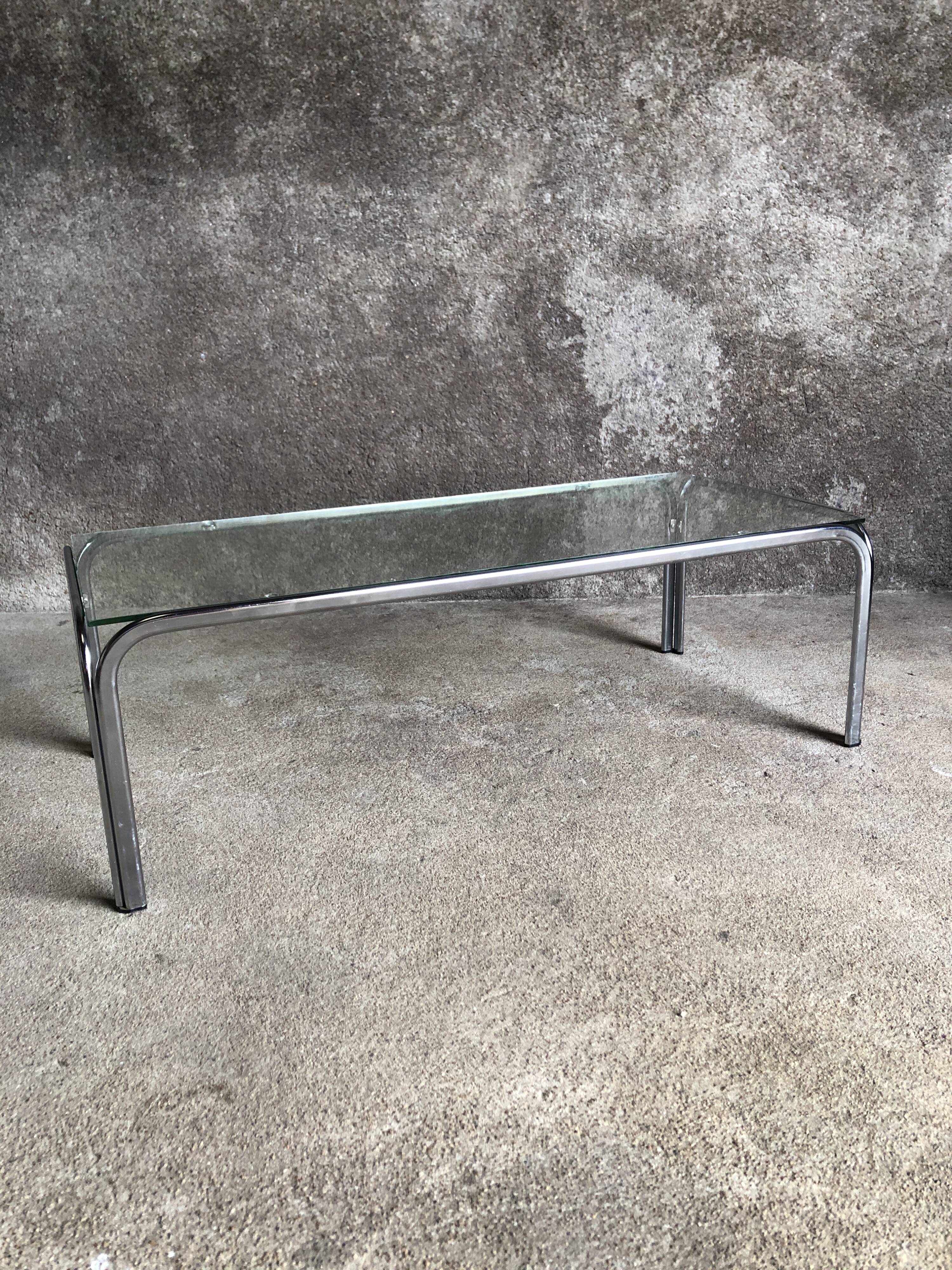 Coffee table with chrome legs and glass top, 1970