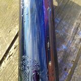 Vintage decorated glass bottle