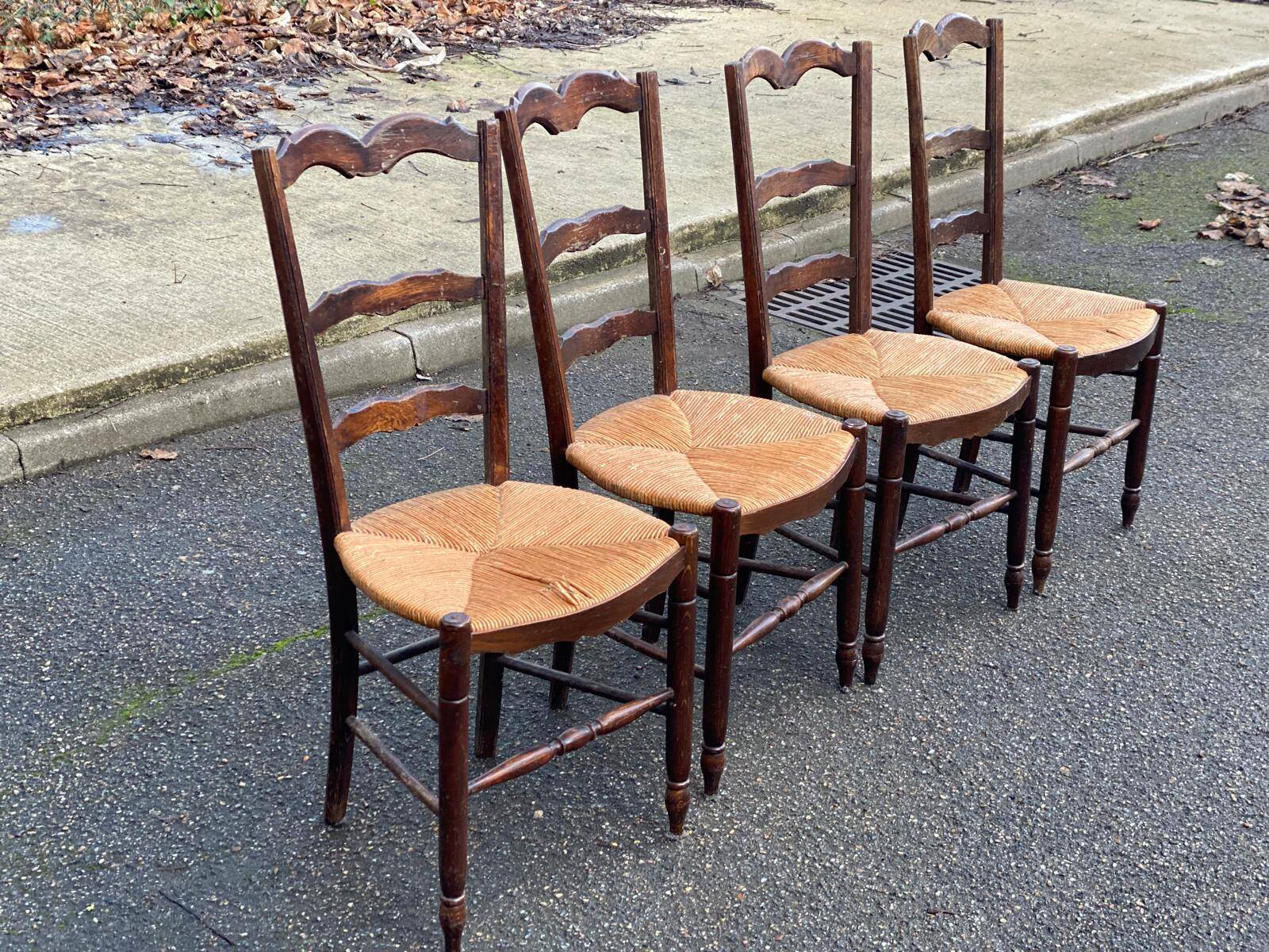 4 Provençal chairs, solid dark oak with rush seats.