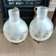 Pair of vintage wall sconces in brass and frosted engraved glass.