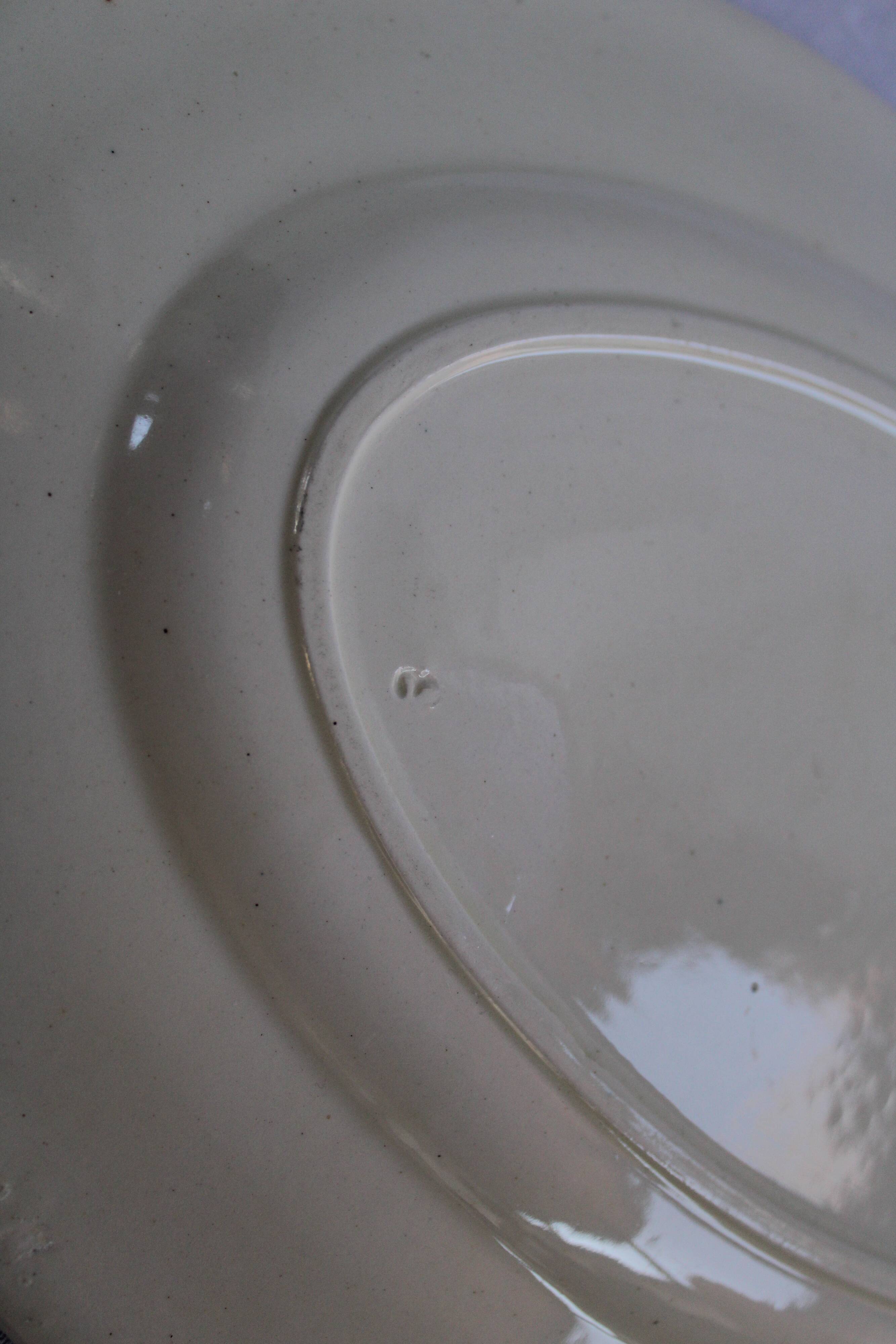 Oval plate in earthenware decoration garland Louis XVI green