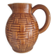 Caramel brown pitcher in glazed ceramic with barbotine finish from the 60s