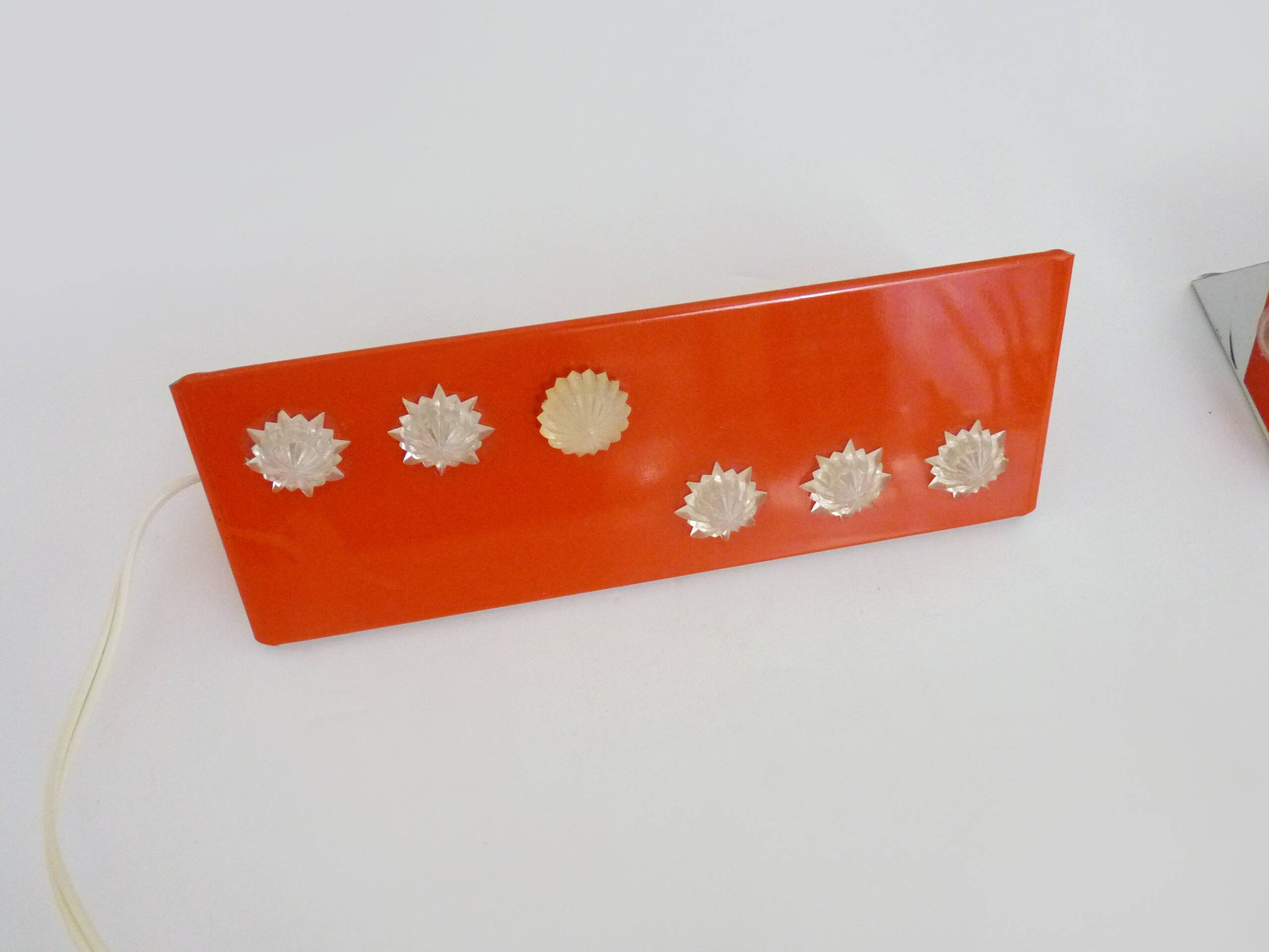 Pair of Scandinavian wall sconces with swivel shade in orange metal. 70