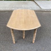 Table à manger ronde volets extensible Louis Philippe décapée en chêne brut