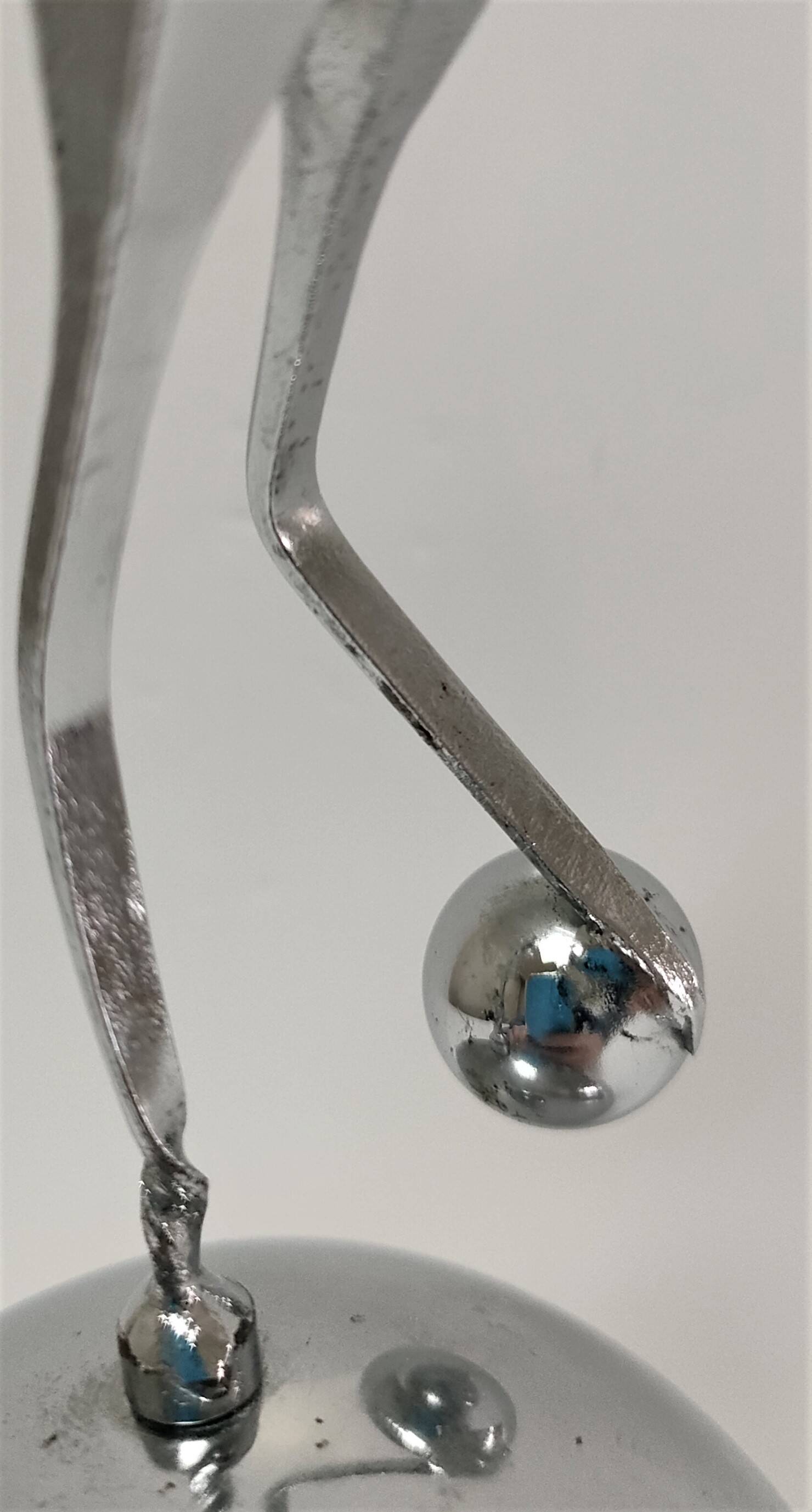 steel sculpture, sportsman's hallmark, goldsmith's crown