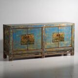 Old wooden entrance buffet in blue and yellow tones (circa 1920).