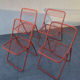 4 red 70s chairs