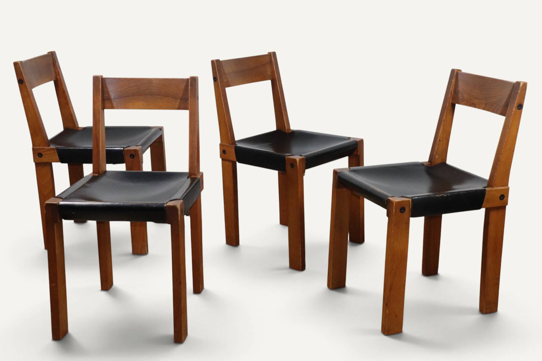 Set of 4 S24 chairs by Pierre Chapo – Solid elm and black leather – 1970