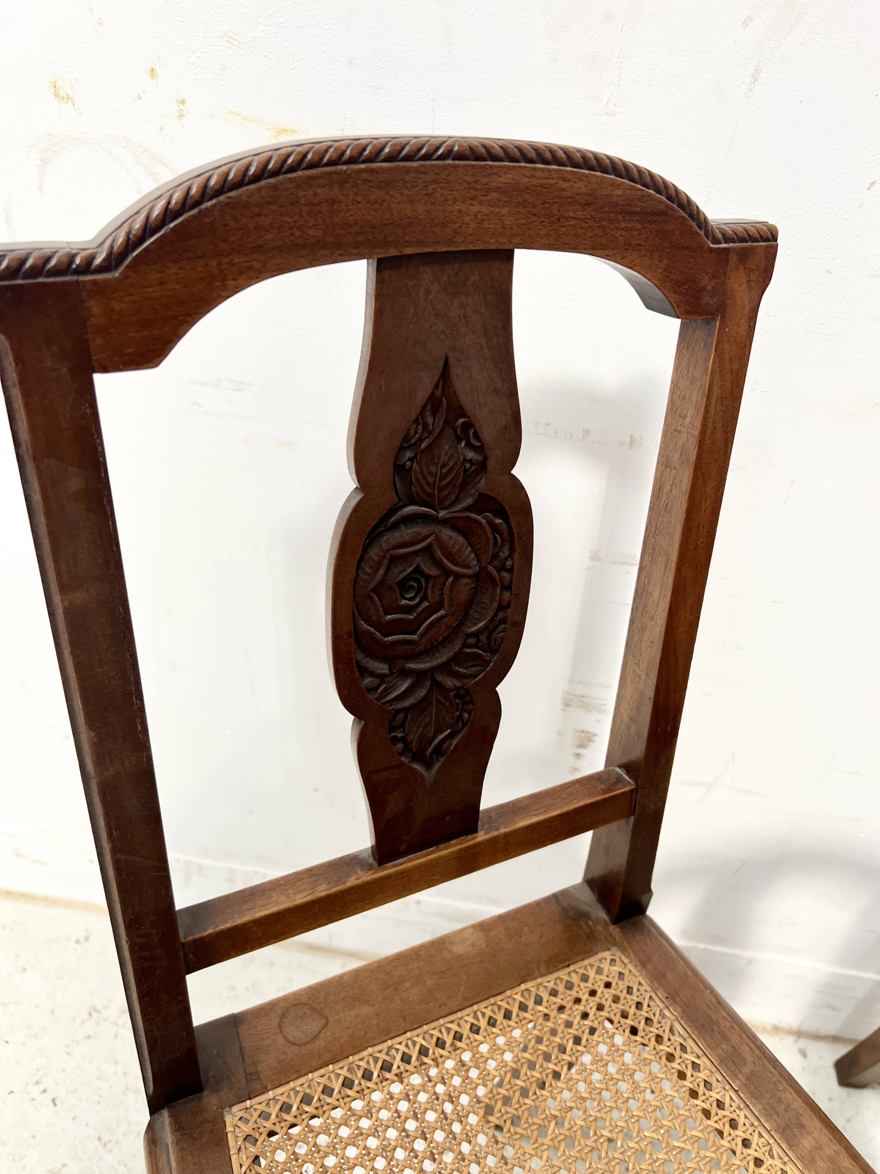 Set of six Art Deco chairs in solid walnut, 20th century.