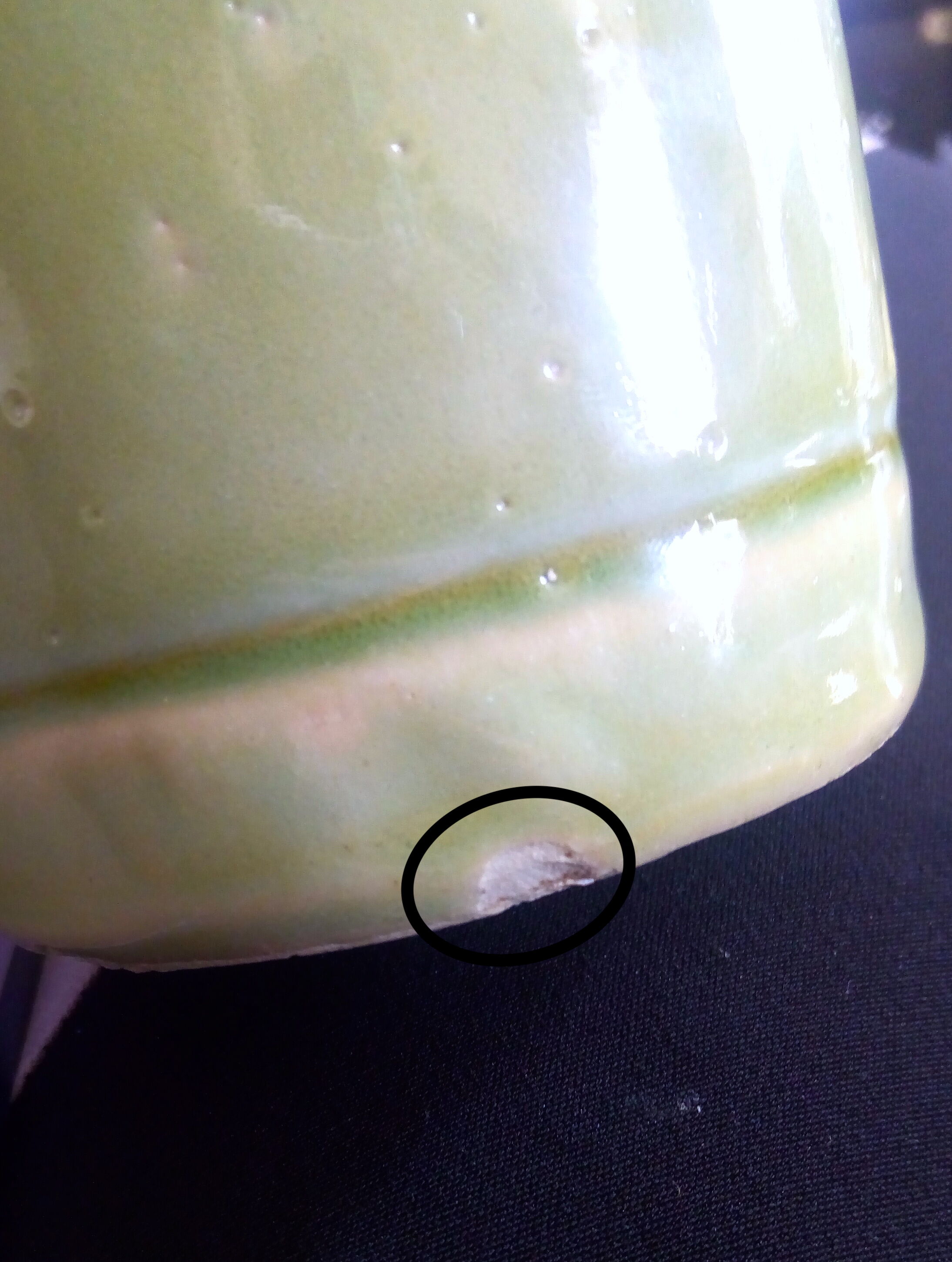 Apple green enamelled sandstone bottle
