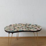 Unusual coffee table on three legs