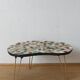 Unusual coffee table on three legs