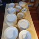 White and yellow porcelain dinner service with gold edging, Poral Limoges France