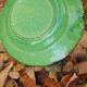 Hollow plate in green glazed clay Etienne Noël