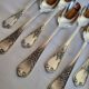 12 small silver-plated metal spoons by Guildart