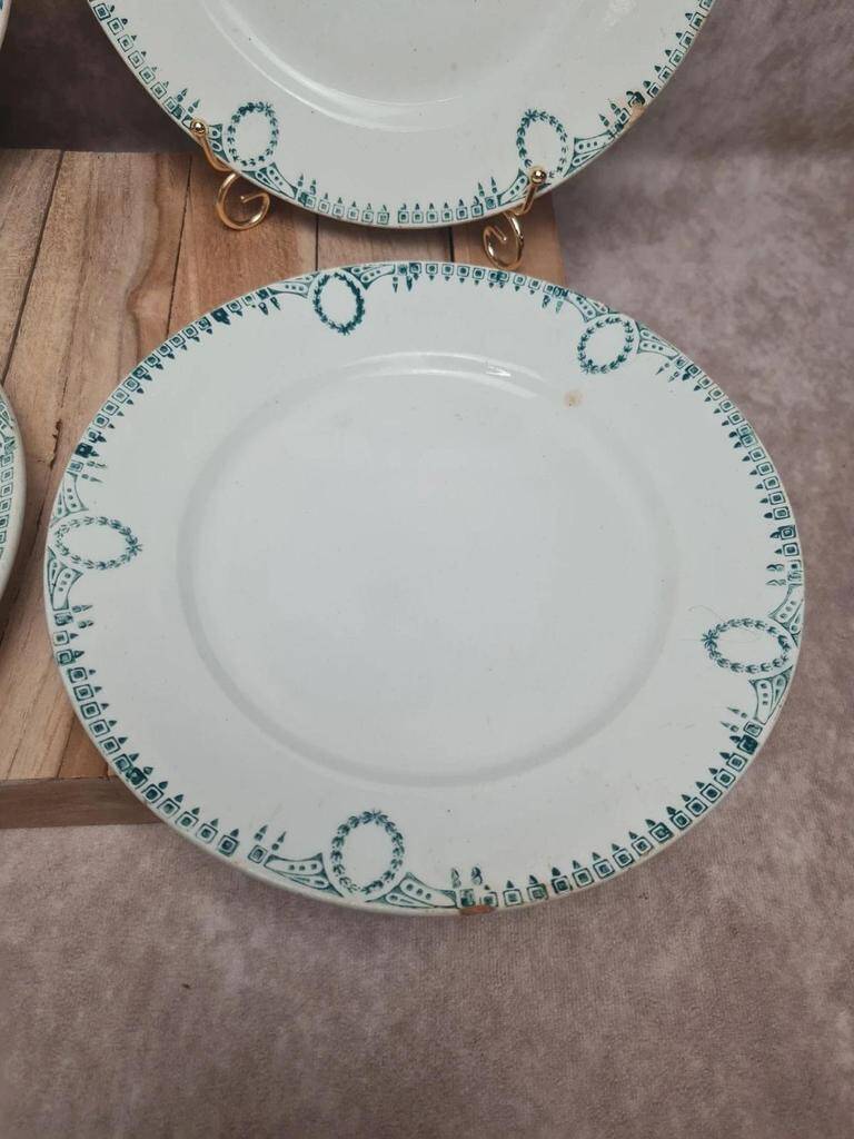 Set of 4 antique plates, Terre de fer Saint-Amand, green decoration.