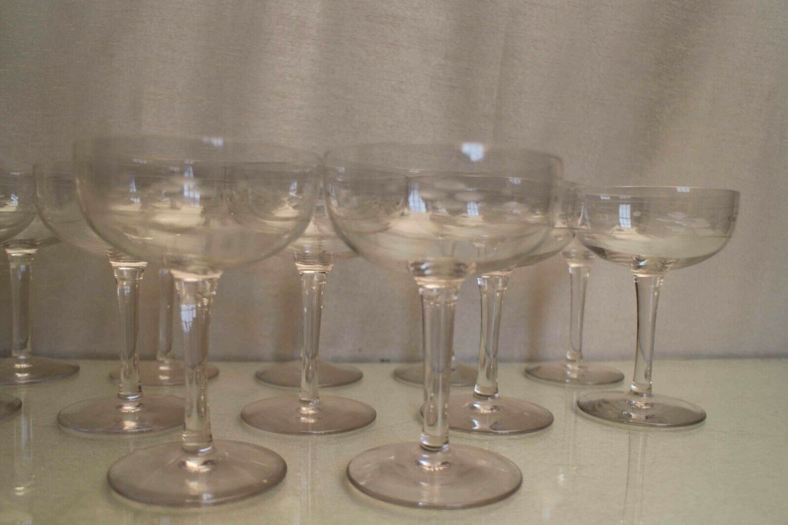 Suite of 12 crystal champagne glasses