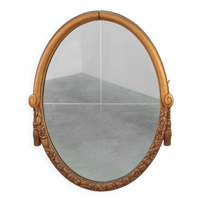 Miroir en chêne doré ovale français sculpté art déco, vers 1925