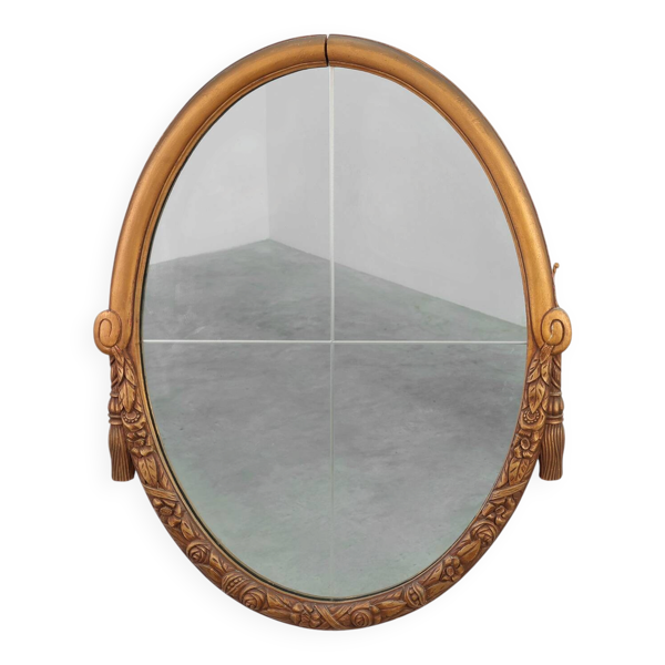 Miroir en chêne doré ovale français sculpté art déco, vers 1925