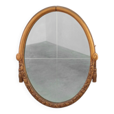 Miroir en chêne doré ovale français sculpté art déco, vers 1925