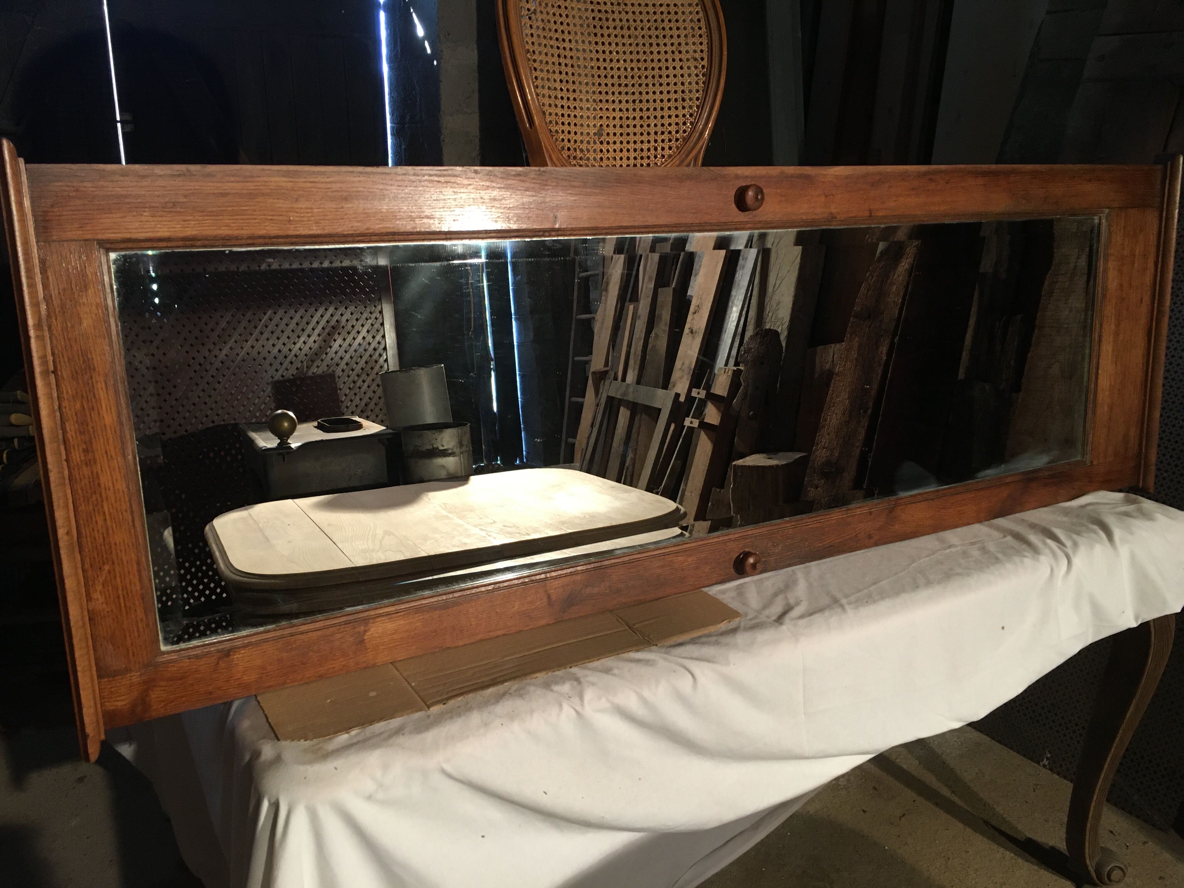 Bevelled mirror oak frame