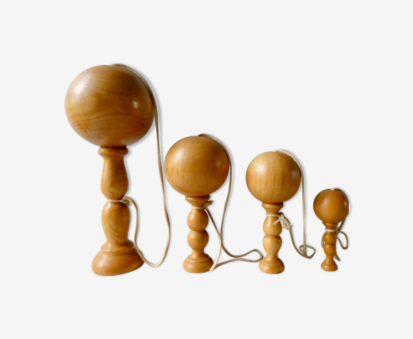 Set of 4 old light wood bilboquets