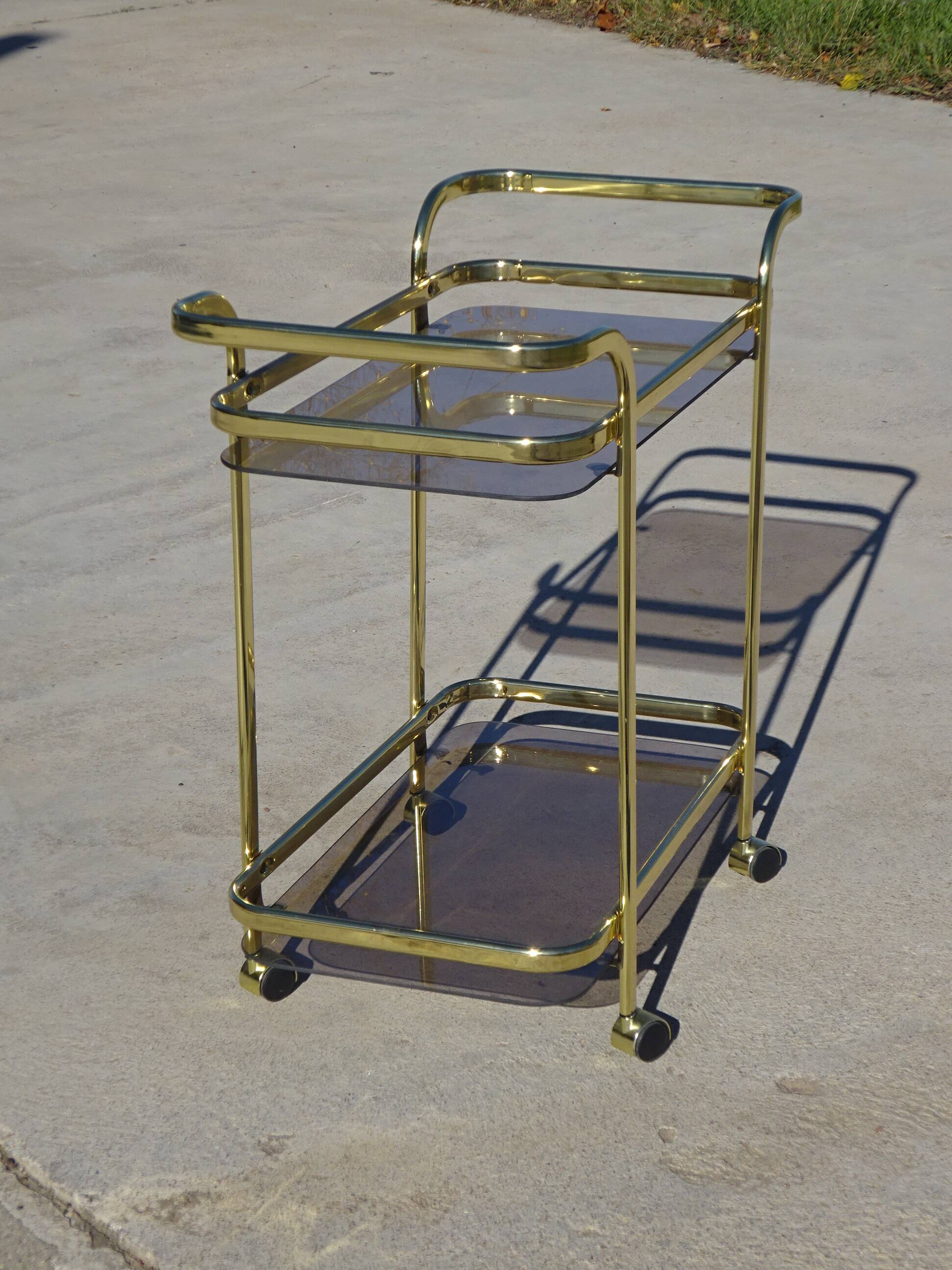 Golden metal and smoked glass dessert table
